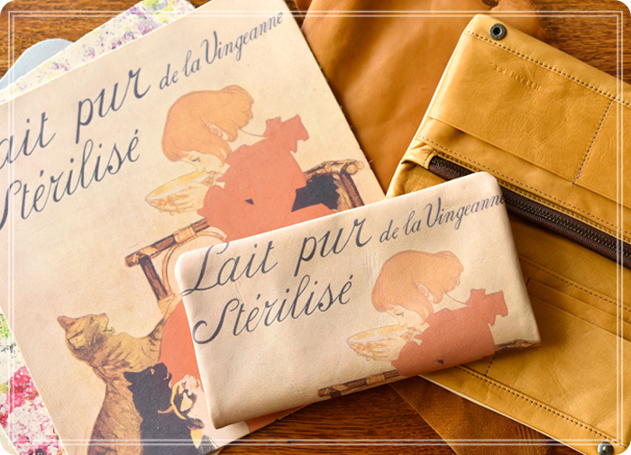 ラウンドシリーズに使用されているアートレザー、革のディテールイメージと、長財布（スタンラン/ミルク柄）