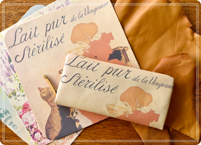 ラウンドシリーズに使用されているアートレザー、革のディテールイメージと、ラウンドファスナー長財布（スタンラン/ミルク柄）